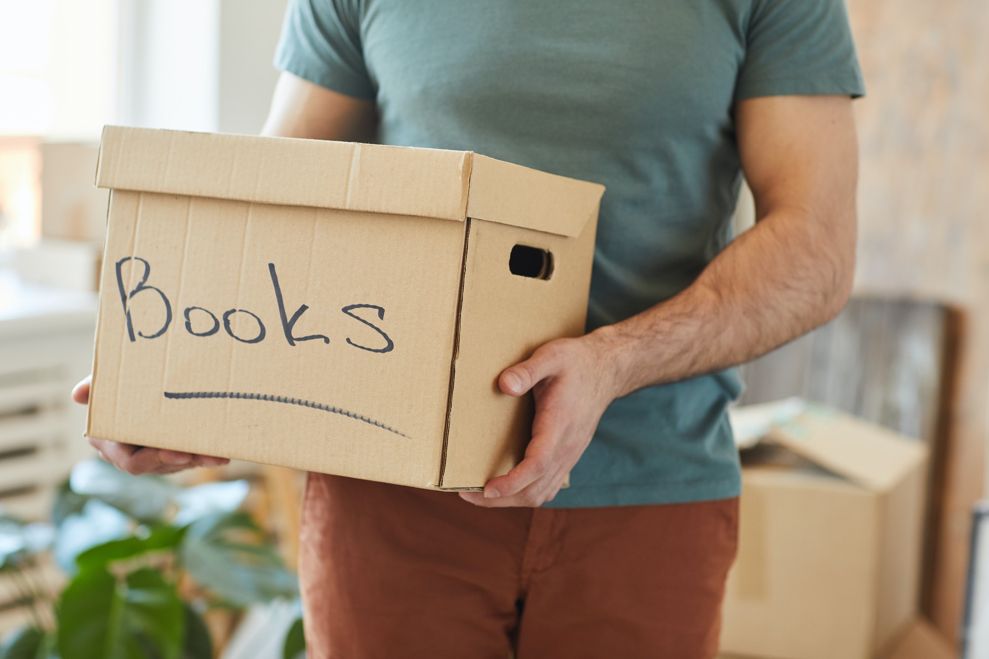 Packing books in box